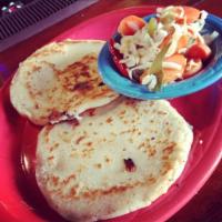 Pupusas Plate · 2 thick corn mill stuff tortillas with pork and cheese (chicharron) or just cheese. side of ...