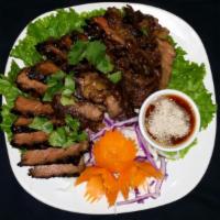 S10. Tiger Cry · Grilled marinated rice-eye steak and served with spicy tamarind sauce.