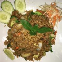 069. Basil Fried Rice · Stir-fried rice with Thai basil, bell pepper, garlic, yellow pnion, garlic and jalapeno.