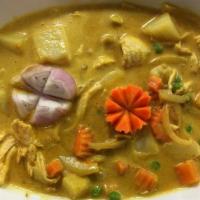 082. Yellow Curry · Yellow curry paste with potato, peas, carrot, yellow onion and coconut milk. Served with ste...