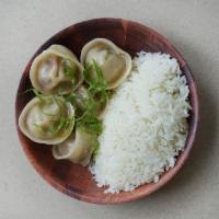 Kids Jjin Mandu · House-made steamed dumplings with pork, beef, and kimchi.  Served with a side of rice.