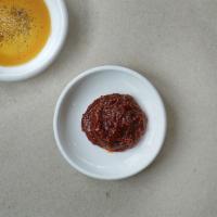 Side Ssamjang · Fermented soy bean paste combined with our house gochujang, garlic and sesame oil.  Perfect ...