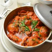 Fish Stew Boulabaisse Special · Lobster, clams, mussels, shrimps, calamari, octopus, salmon, assorted fish with peppers, oni...