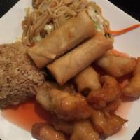 Sweet and Sour Chicken Dinner Combo · Lightly battered with pineapple, chicken, onions and bell peppers tossed in sweet and sour s...