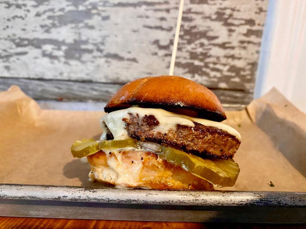 Portland Burger  · Full. Beef, American cheese, raw onions, pickle, and aioli on brioche. Add salad for an additional charge.