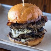 Steel Burger  · Double beef, bacon, American cheese, caramelized onions, aioli on brioche. Add salad for an ...