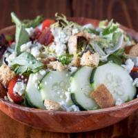 Mixed Greens Salad · Mixed greens, tomatoes, cucumbers, blue cheese, croutons, balsamic dressing.
