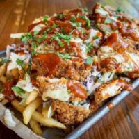 Loaded Tilikum Fries · PDX truffle fries, topped with tilikum fried chicken, jamison BBQ sauce, creamy slaw and aio...