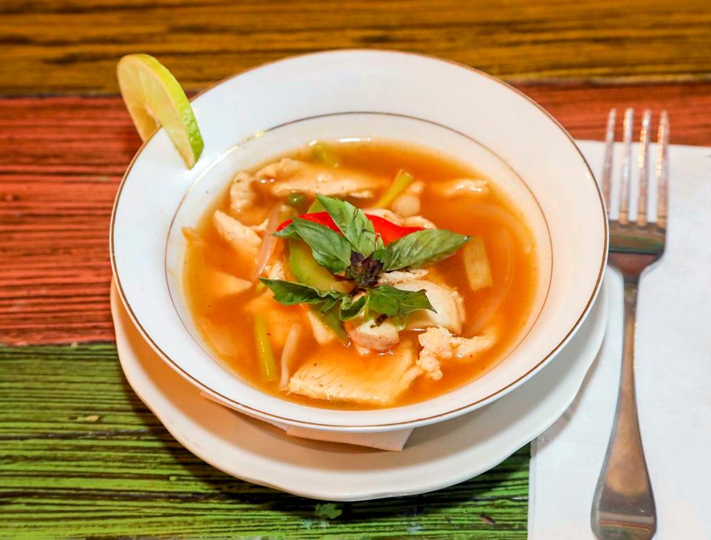 Tom Yum · Lemongrass hot and sour soup. Spicy soup of Thailand mushrooms, lime juice, imported lemongrass, roasted Thai chili and chef's own authentic blend of herbs and spices. Spicy.