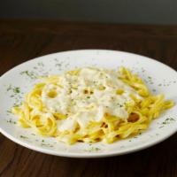 Fettucine Alfredo · 10 oz. fettuccine pasta noodles with Alfredo sauce, served with 3