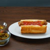 Italian Sausage Sandwich · An Italian sausage sandwich with a choice of marinara sauce or au jus