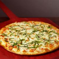Margherita Pizza · Our own version of this light authentic Italian classic featuring an olive oil base with fre...