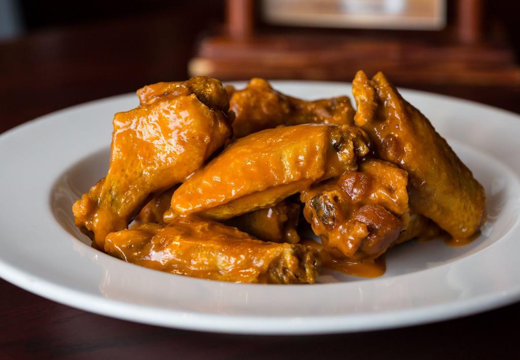 10 Traditional Jumbo Wings · Award-Winning jumbo wings cooked fresh to order & served with house-made blue cheese or ranch.