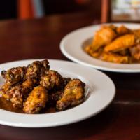 24 Traditional Jumbo Wings · Award-Winning jumbo wings cooked fresh to order & served with house-made blue cheese or ranch.