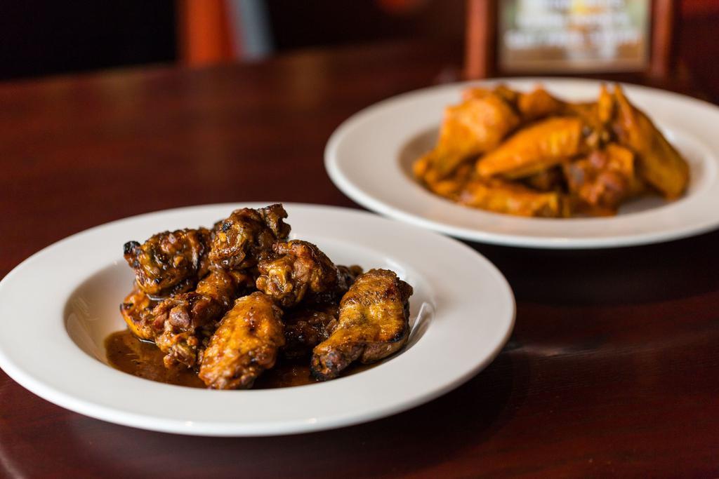 24 Traditional Jumbo Wings · Award-Winning jumbo wings cooked fresh to order & served with house-made blue cheese or ranch.