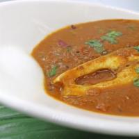 Andhra Fish Pulusu (Pomfret Fish) · Pomfret Fish cooked in special tamarind (sour) sauce, pan fried, garnished with onion and ch...