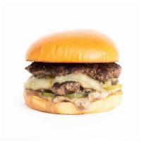The Black Garlic Burger · Smashed Double Patties, Dashi Onions, Provolone Cheese, Pickle Chips, Black Garlic Sauce on ...