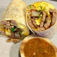 The Sausage Burrito · 2 scrambled eggs, sausage, breakfast potatoes, and melted cheddar cheese wrapped in a fresh ...
