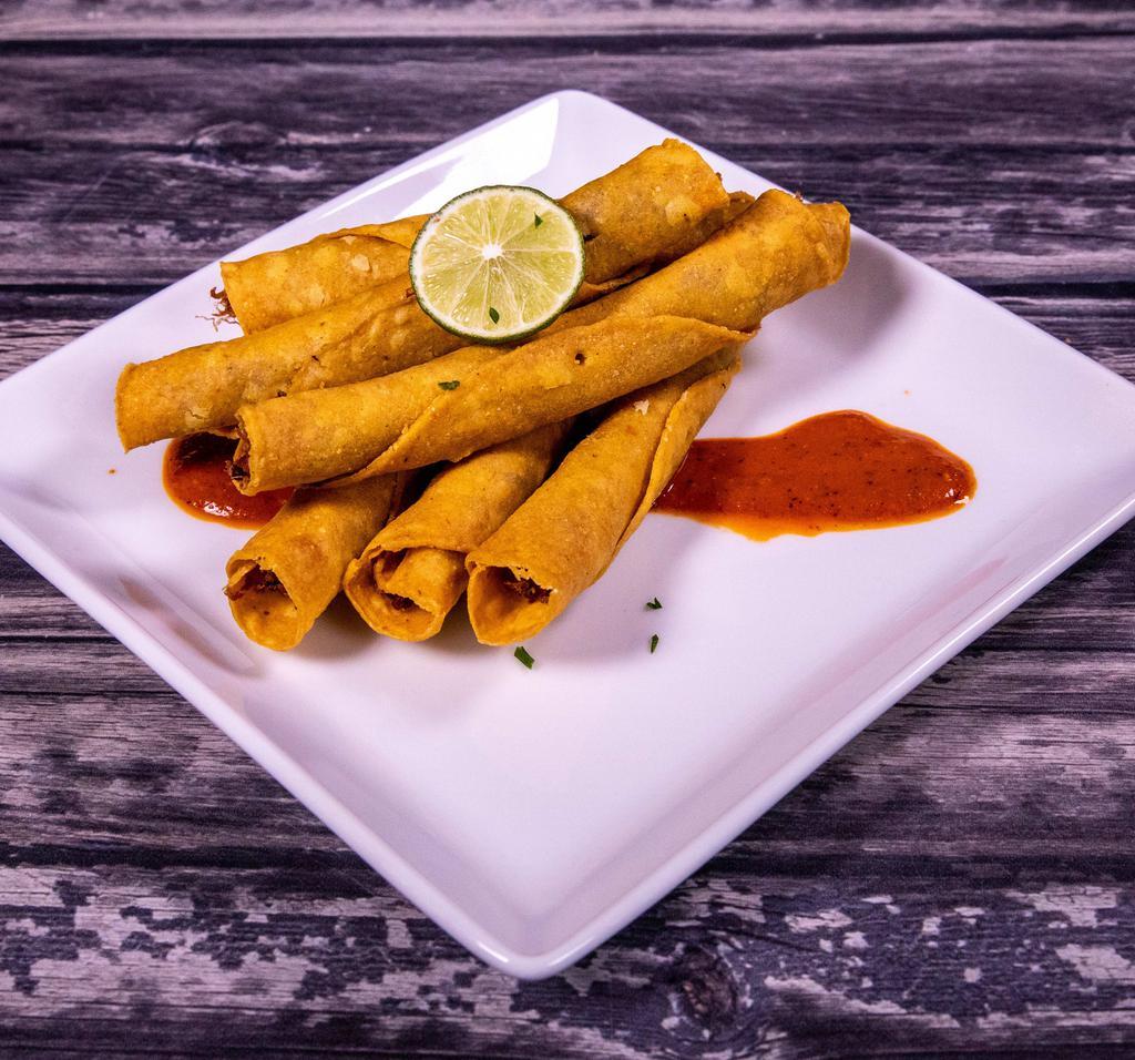17. Flautas Plate · 6 beef or chicken flautas served with rice, beans and salad with a side of sour cream and guacamole.