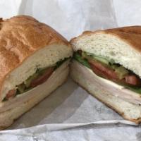 Turkey  · Served with lettuce, tomato, bell pepper and red onion