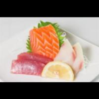 5. Sashimi Appetizer · 7 pieces of sashimi with chef's choice.