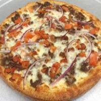 Steak Supreme Pizza · Ranch sauce, steak, fresh tomatoes, red onions and mozzarella.