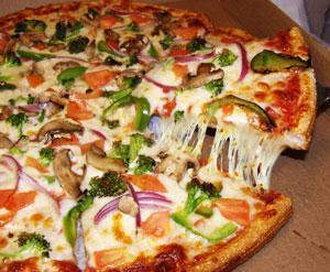 Grilled Chicken Veggie Pizza · Grilled chicken, fresh tomatoes, mushrooms, peppers, onions and mozzarella.