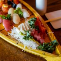 Sushi and Sashimi · 2 pieces of sushi- tuna, salmon, yellowtail and snapper. 4 pieces of sashimi- tuna, salmon a...