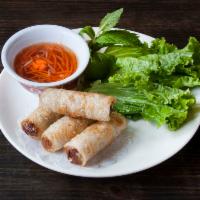A2. Vietnamese Crispy Spring Roll · Cha gio. Vietnamese spring roll with pork and vegetable, served with lettuce, mint leaves, a...
