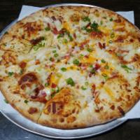 Mashed Potato and Bacon Pizza · Mashed potatoes, mozzarella, cheddar, green onion and bacon.