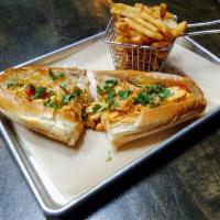 Santa Fe Chicken Sub · Spicy santa fe sauce sauteed with chicken breast, bell peppers and onions topped with fresh ...