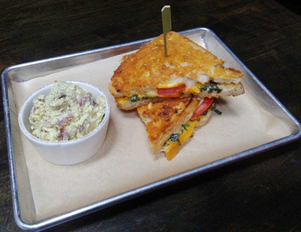 Taproom Grilled Cheese · Cheddar, swiss, american, fresh basil, tomato, on Parmesan crusted sourdough.