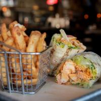 Buffalo Chicken Caesar Wrap · Romaine, Parmesan, croutons, grilled buffalo chicken and housemade Caesar dressing.