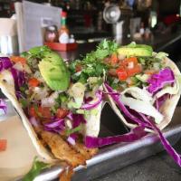 Grilled Fish Tacos Plate · 2 grilled fish tacos topped with chipotle aioli, shredded cabbage, pico de gallo, cilantro, ...
