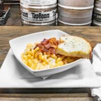Beer Mac and Cheese · Macaroni in housemade beer cheese sauce sauteéd with garlic, topped with mozzarella, bacon, ...