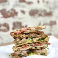 Hot Blonde Hot Sandwich · Cherry-smoked chicken, avocado, Swiss cheese, grilled onions, sliced tomato, cucumber, spina...