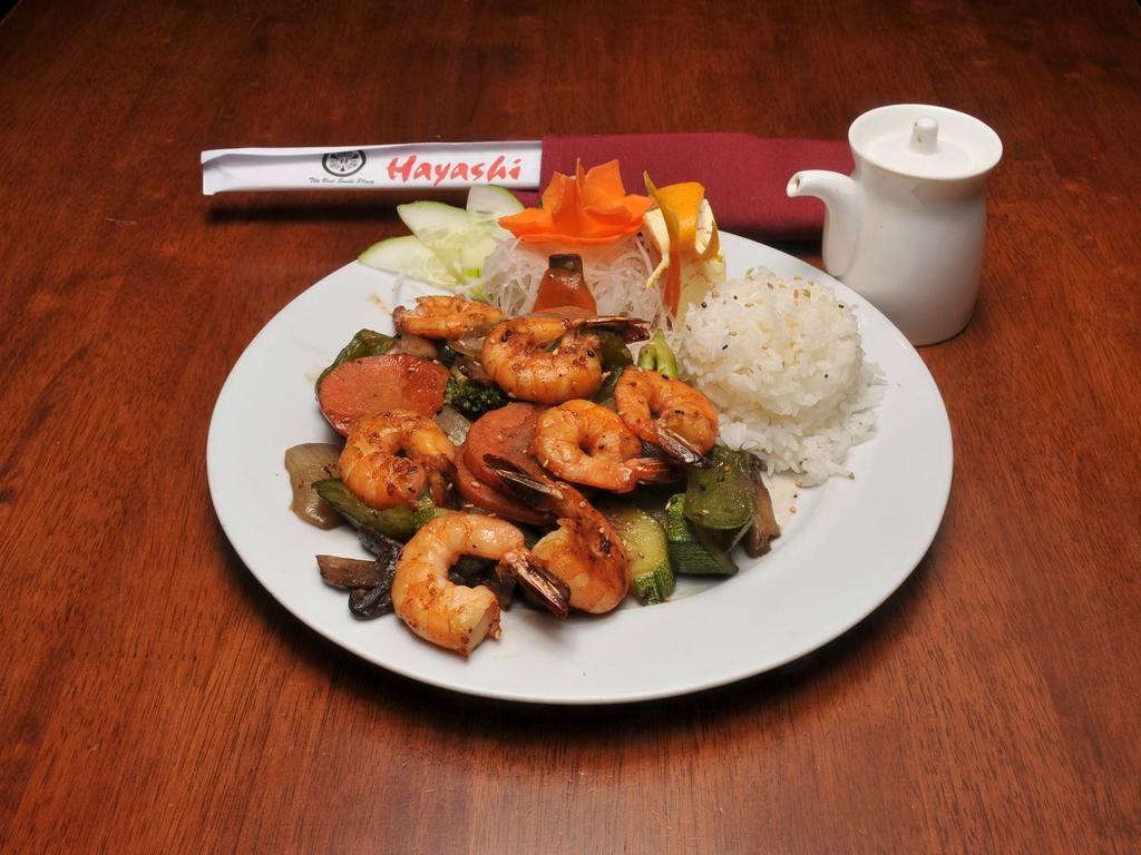 Hibachi Shrimp · Cooked with just the right touch of seasoning to bring out the flavor of delicate shrimp and served with grilled fresh vegetables. Served with house salad and miso soup.