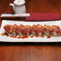 Screaming O Roll · Shrimp tempura, spicy tuna topped seared tuna with screaming O sauce.