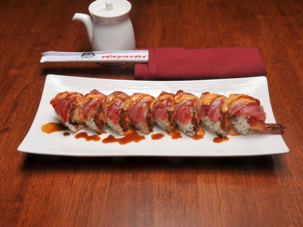 Screaming O Roll · Shrimp tempura, spicy tuna topped seared tuna with screaming O sauce.