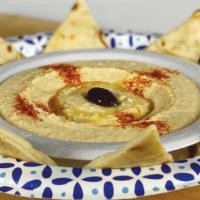 Hummus · House blended chickpeas, tahini (sesame seed oil), olive oil, garlic spice, and lemon juice....