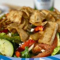 Chicken Gyro Salad · Chicken Gyro, with a blend of lettuce, tomatoes, onions, red and green peppers, cucumbers, f...