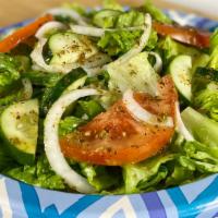 Garden Salad · A blend of lettuce, tomatoes, onions, cucumbers with choice of dressing.