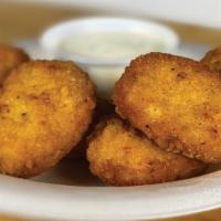 Chicken Nuggets · Tender chicken nuggets fried to perfection and served with ranch dressing.