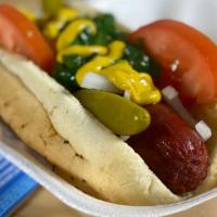 Chicago Dog · An all-beef hot dog served the way in Chicago. Served on a freshly steamed poppy seed bun an...