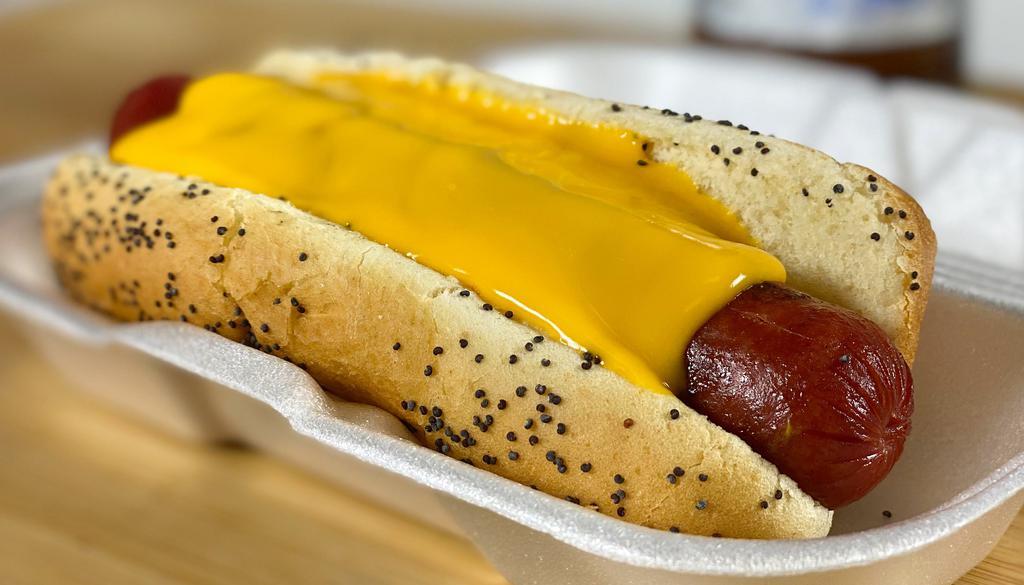 Cheddar Dog · Our Chicago dog with cheddar cheese and your choice of toppings.