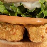 Fishless Sandwich  · Crispy breaded fishless fillet on a whole wheat bun with lettuce, tomatoes and tartar sauce. 