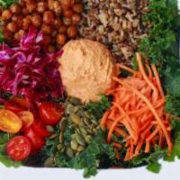 Plant Protein Bowl · Signature kale salad, carrots, pickled cabbage, garbanzo beans, cherry tomatoes, pumpkin see...