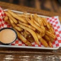 Biergarten Fries · Crisp, thick-cut beer-battered fries, deep fried to golden brown perfection. Served with Lag...