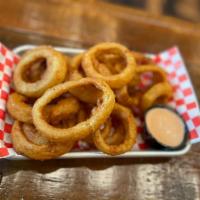 Onion Rings · Battered Onion Rings, deep fried to a crispy golden brown. Served with Lagoon's Southwestern...
