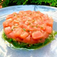 YELLOWFIN TUNA TARTARE · Seaweed, avocado, pink grapefruit, wasabi Tobiko, Ponzu